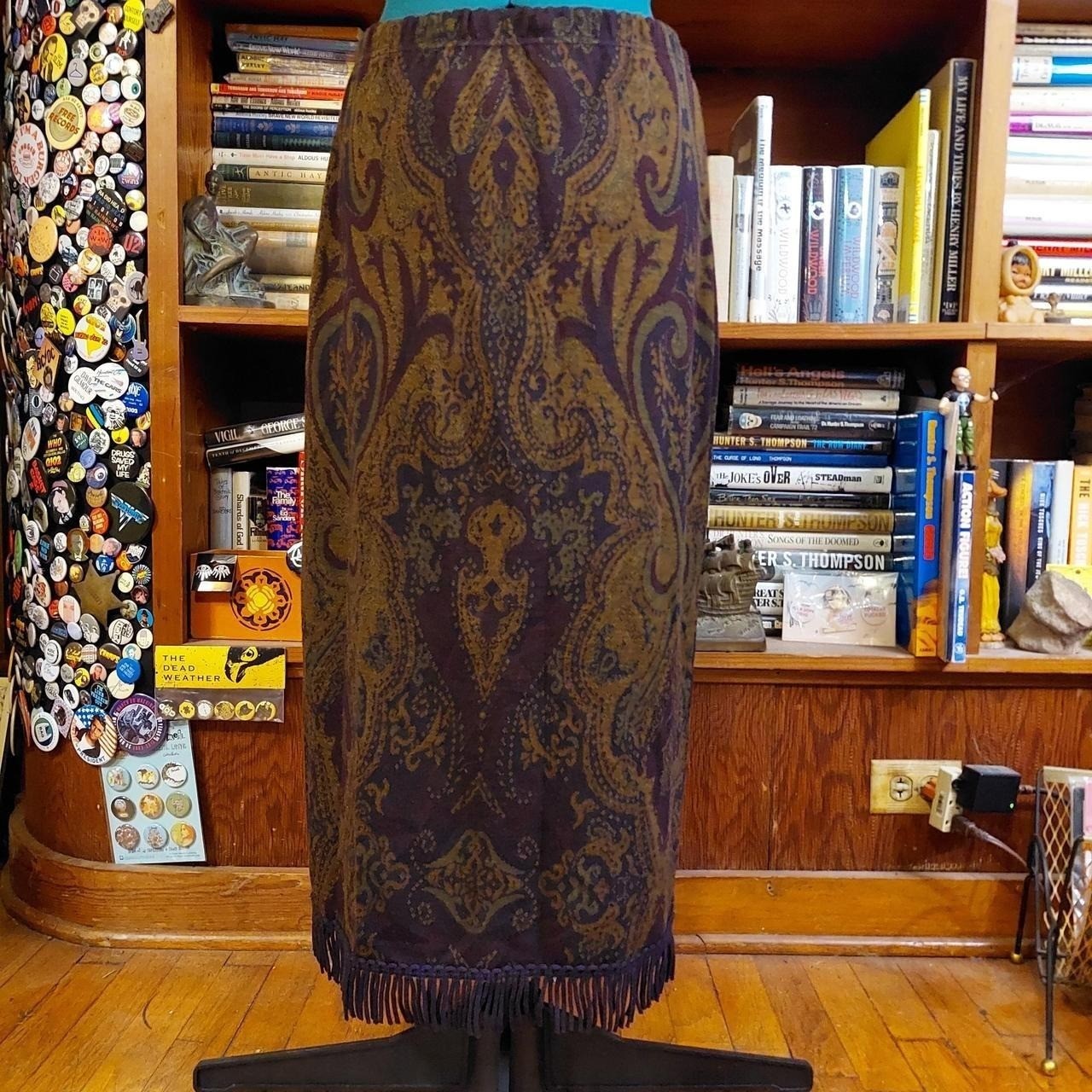 Vintage purple, green, and brown knit paisley skirt with fringe detail.