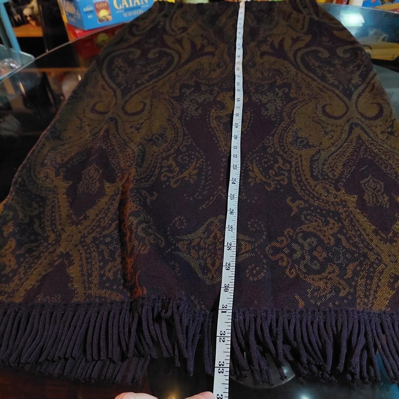 Vintage purple, green, and brown knit paisley skirt with fringe detail.